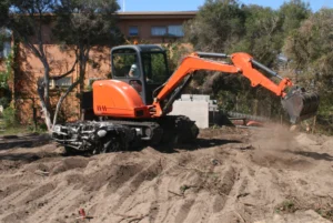 excavator clearing land